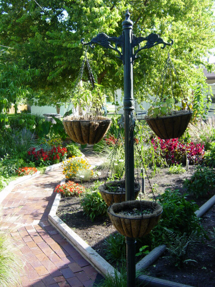 rose walk with hanging pots